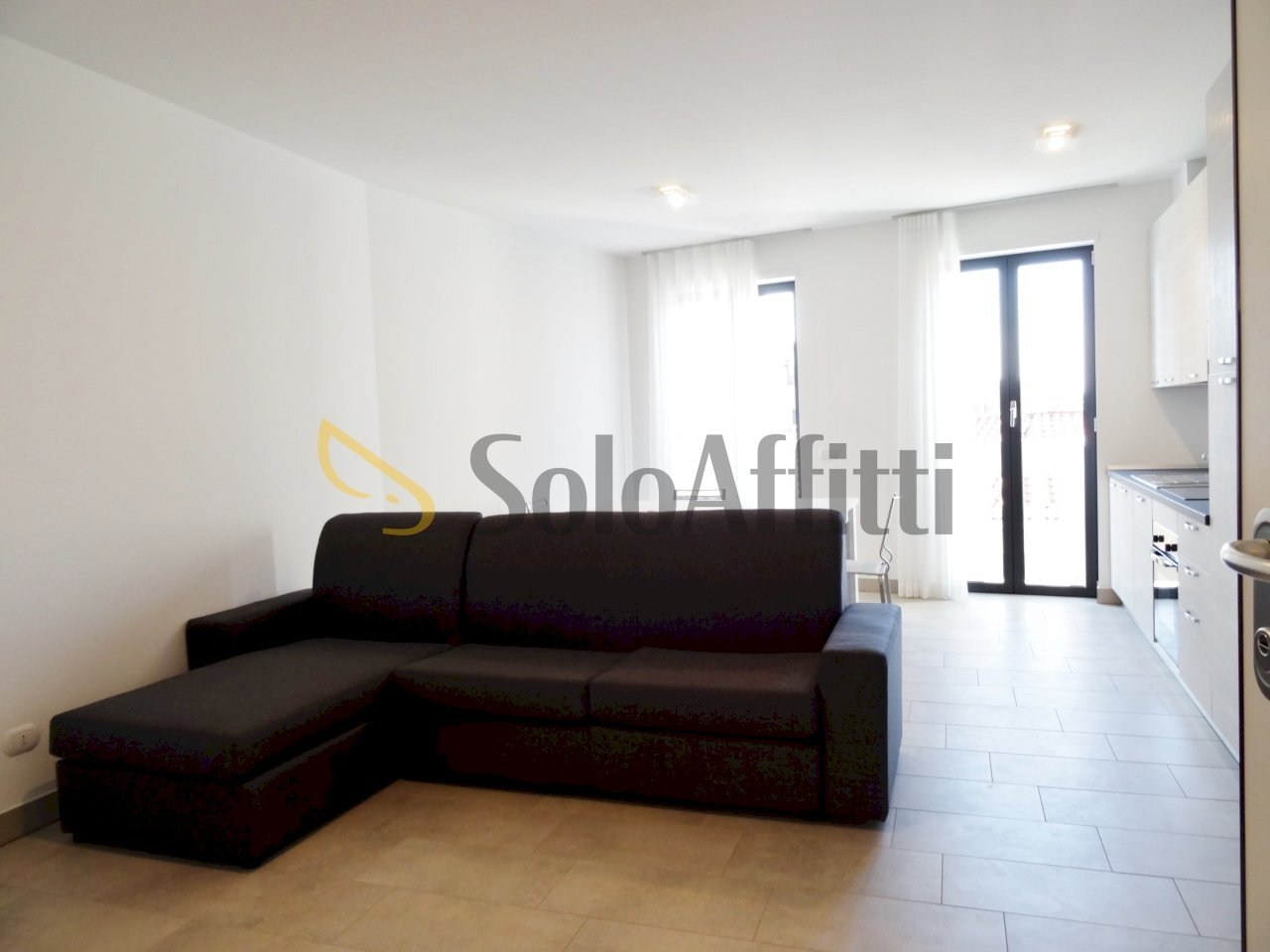 soggiorno con angolo cottura - Appartamento Gallarate - foto 3