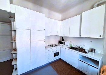 Soggiorno con cucina a vista - Appartamento Via Orti 16, Milano (zona Città Studi) - foto 3
