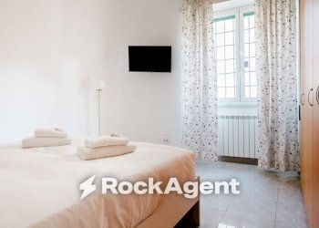 Camera da letto - Three-room apartment via Pietro Maffi, Roma - photo 17