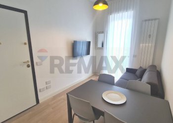 Sala da pranzo - Appartamento Via Guido Guarini Matteucci
1, Milano - foto 2
