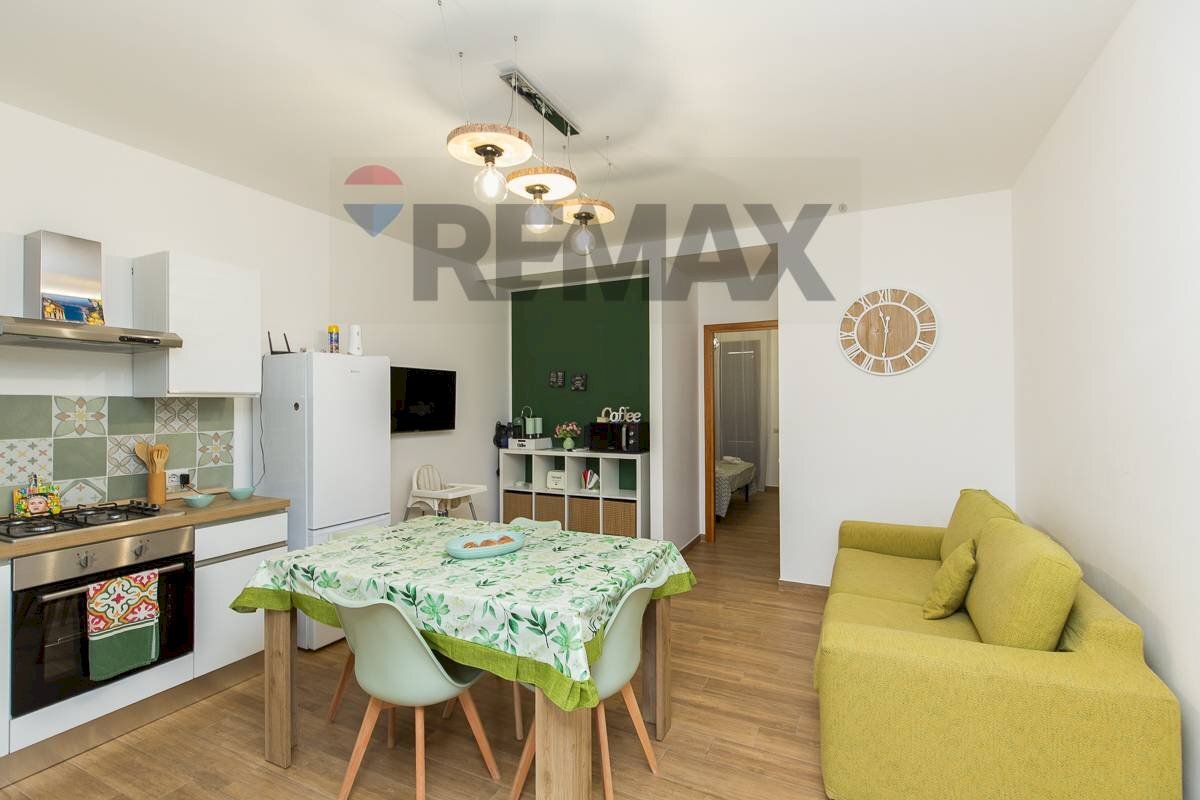 Sala da pranzo - Bilocale Viale Maria Immacolata
 
126, Mascali - foto 1