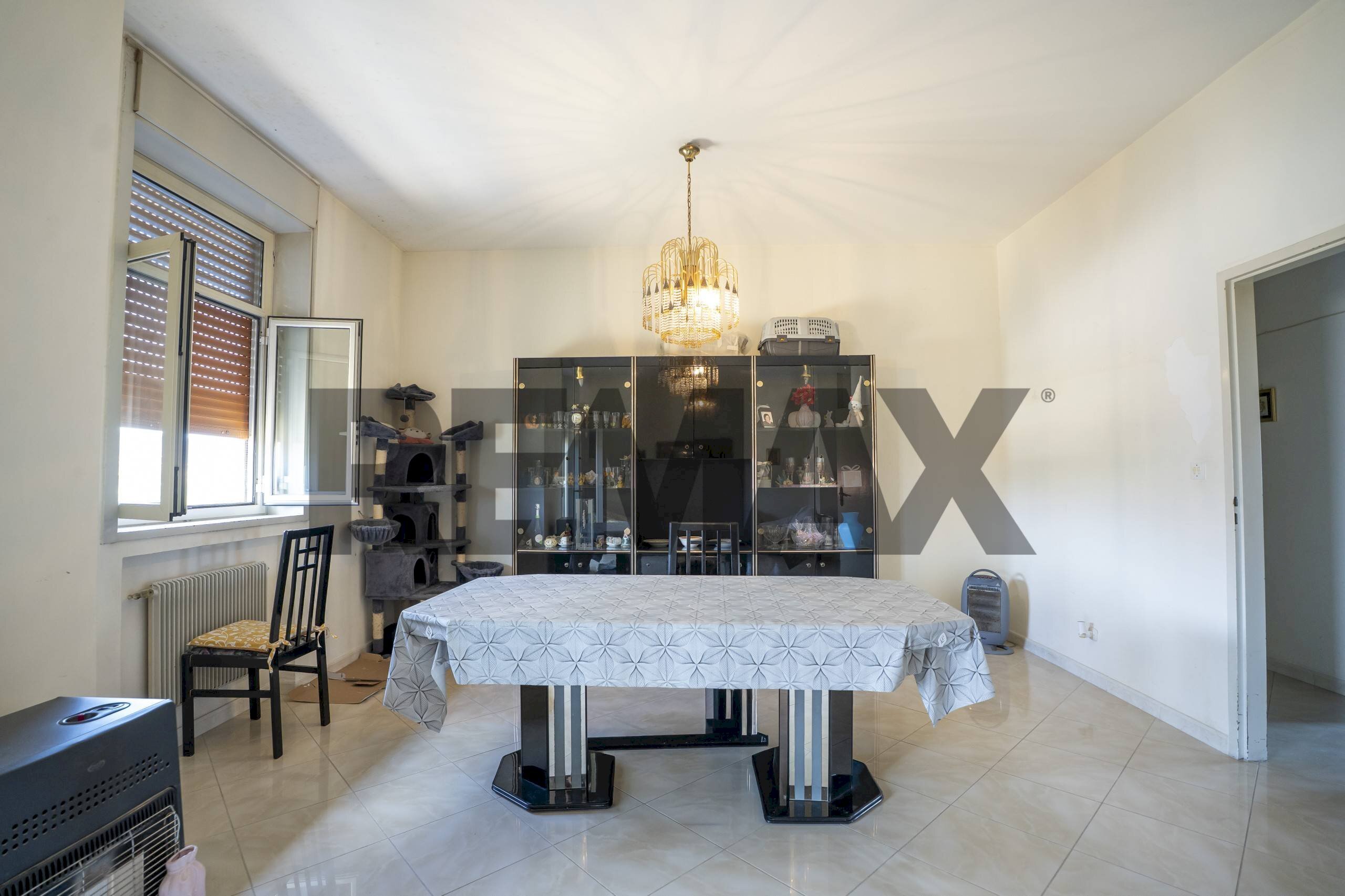 Sala da pranzo - Appartamento Villaggio Sant'Antonio Abate
interno 6, Camporotondo Etneo - foto 2