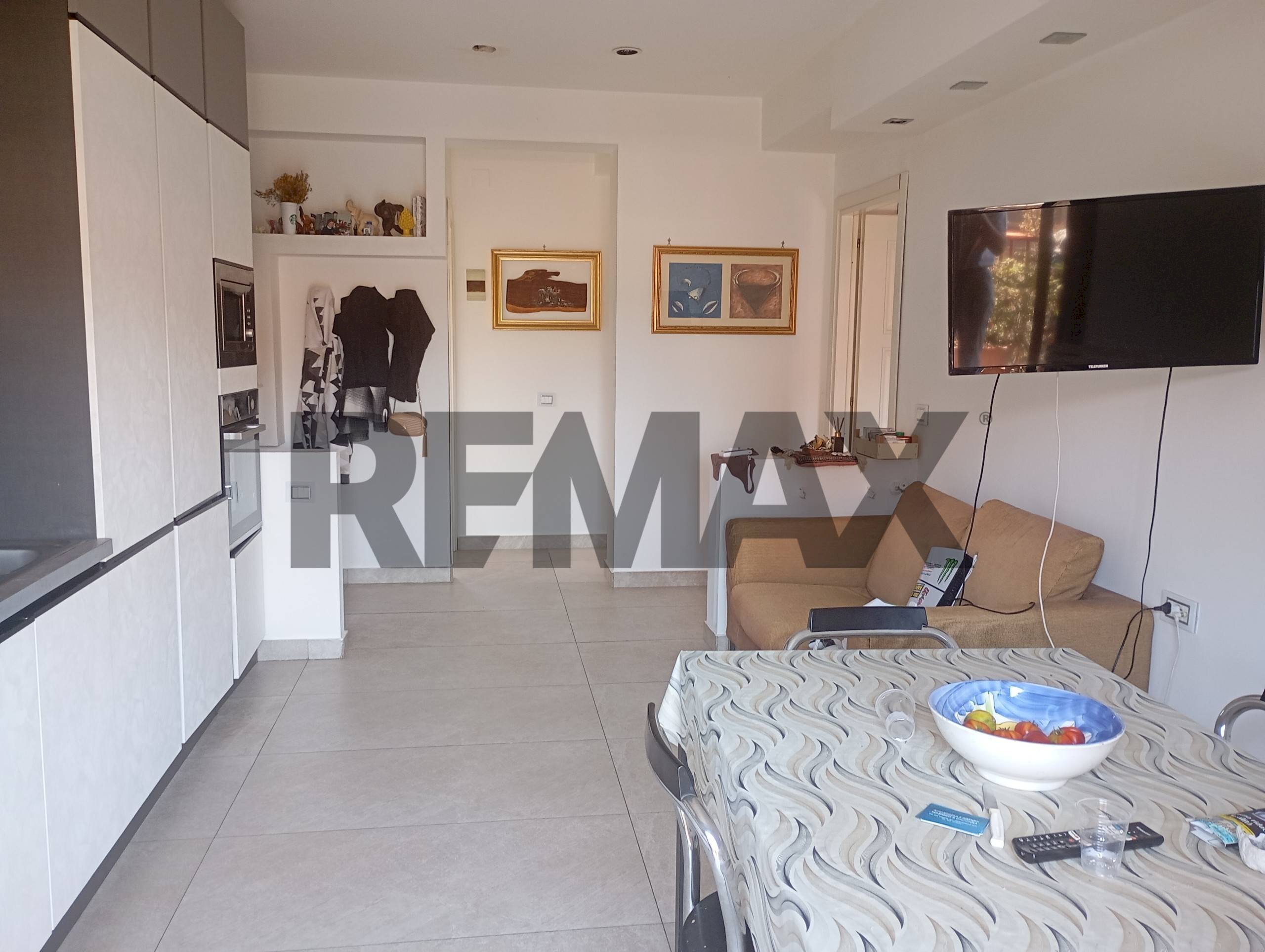 Sala da pranzo - Apartment via Domenico Tempio
5, Aci Castello - photo 2