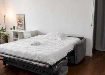 Soggiorno con divano Letto - Three-room apartment Via Goito 14, Rho - photo 3