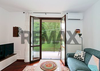 Soggiorno - Bilocale via Roma
25, Calco - foto 30