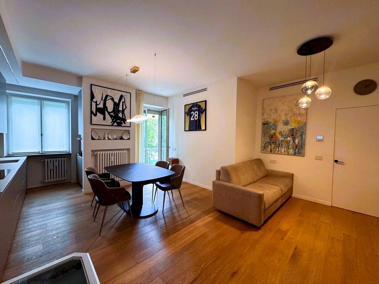 Soggiorno con cucina a vista - Three-room apartment Via Luigi Soderini 47, Milano (neighborhood Lorenteggio) - photo 1
