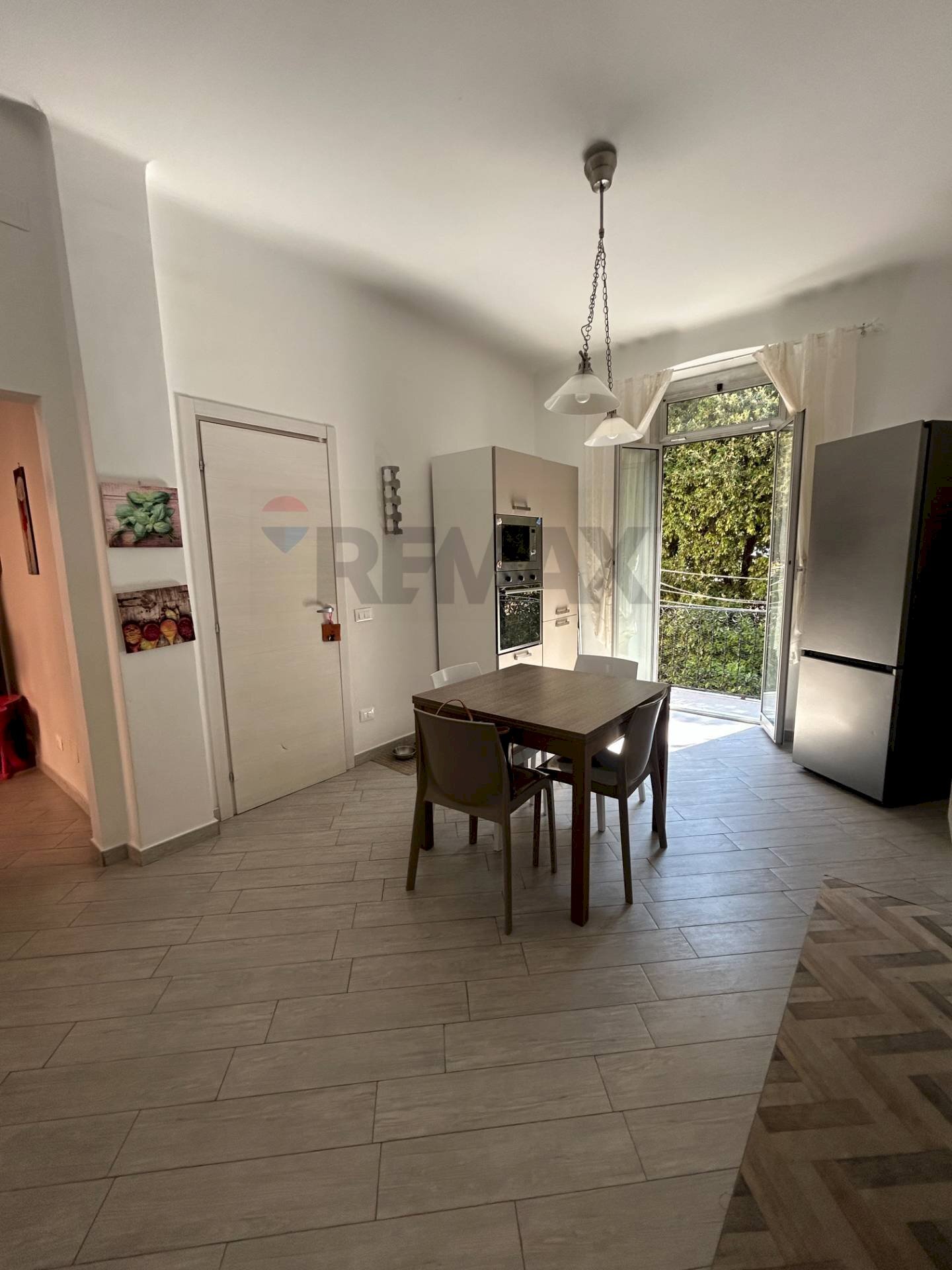 Sala da pranzo - Appartamento via Balestrazzi
 
18, Genova - foto 1