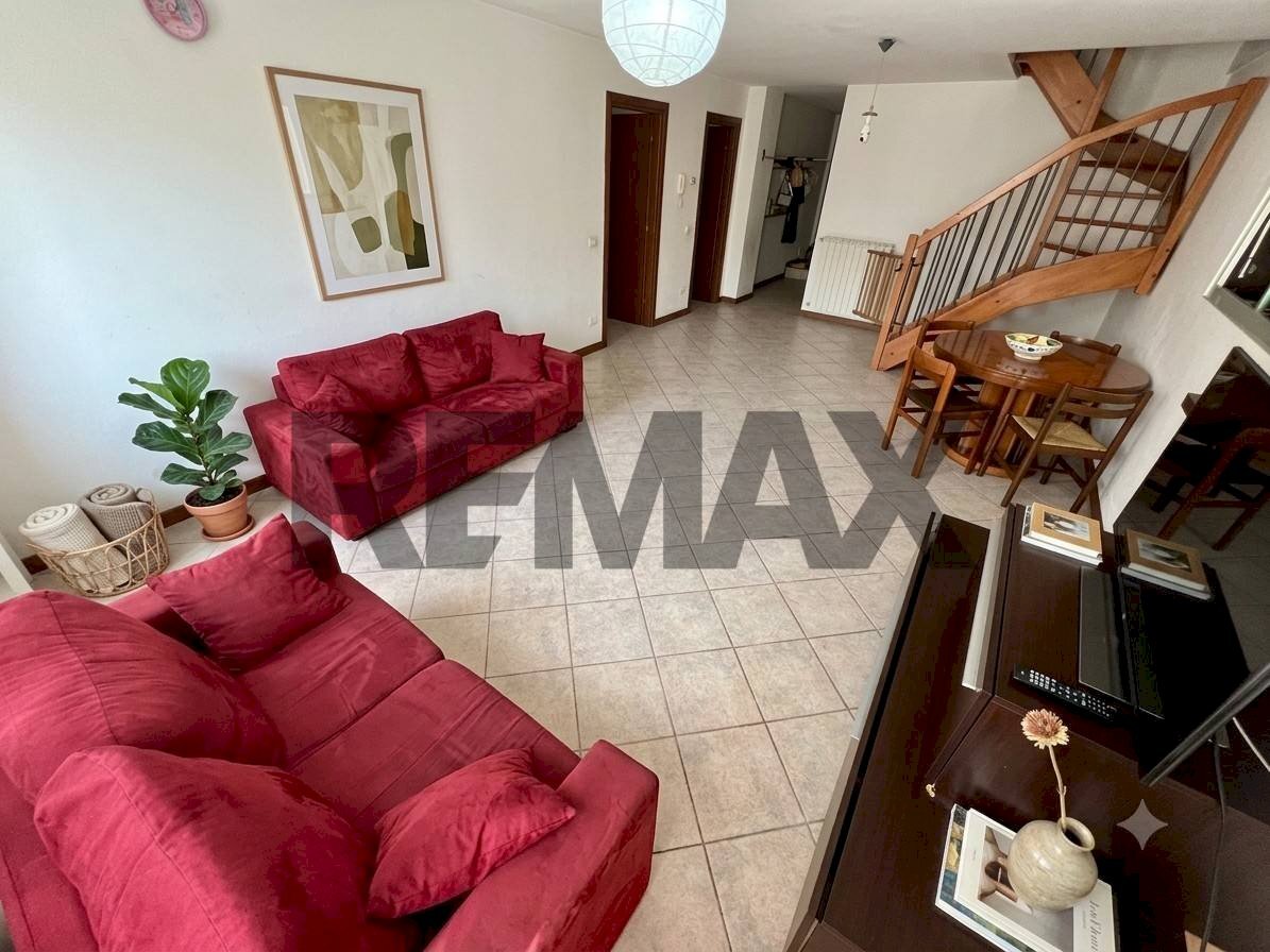 Soggiorno - Three-room apartment via Baiguini
 
18, Costa Volpino - photo 1