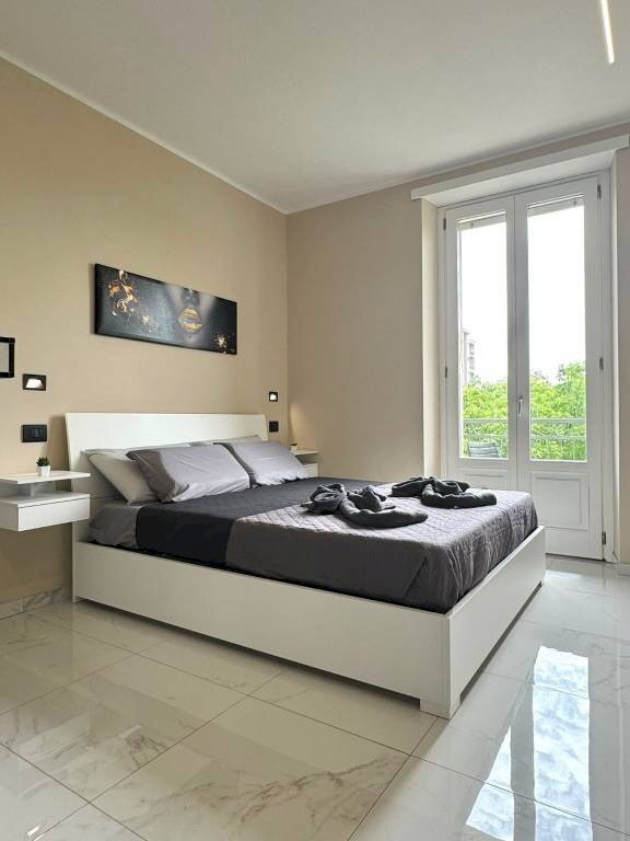 Camera da letto - Bilocale corso Spezia, 19, Torino (zona Lingotto) - foto 2