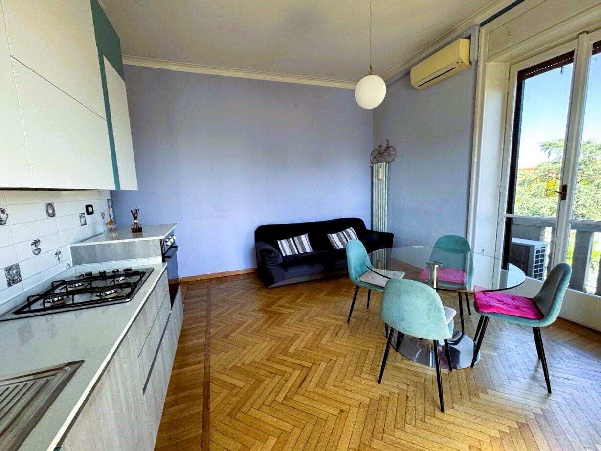 Soggiorno con cucina a vista - Appartamento Via Andrea Maria Ampère 9, Milano (zona Città Studi) - foto 1