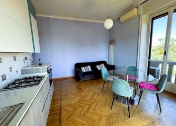 Soggiorno con cucina a vista - Appartamento Via Andrea Maria Ampère 9, Milano (zona Città Studi) - foto 1