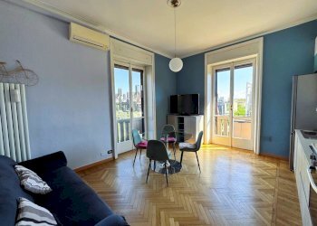 Soggiorno con cucina a vista - Appartamento Via Andrea Maria Ampère 9, Milano (zona Città Studi) - foto 5