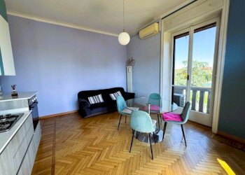 Soggiorno con cucina a vista - Appartamento Via Andrea Maria Ampère 9, Milano (zona Città Studi) - foto 12