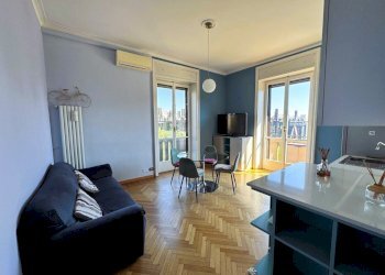 Soggiorno con cucina a vista - Appartamento Via Andrea Maria Ampère 9, Milano (zona Città Studi) - foto 13
