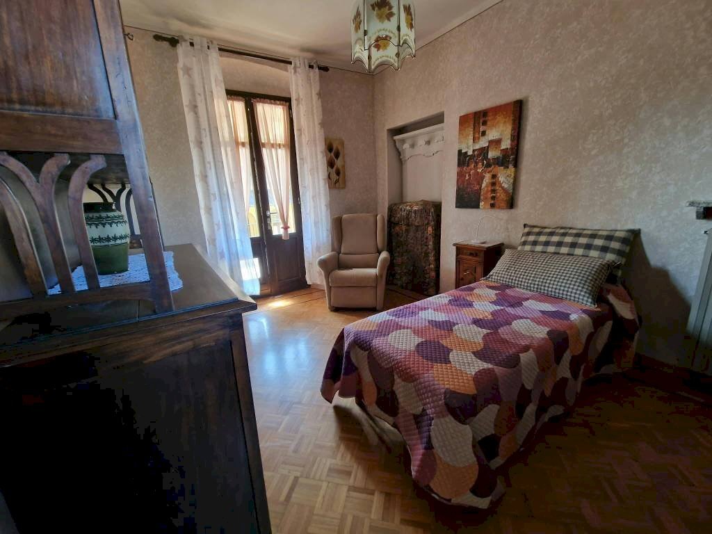 Camera da letto - Bilocale via Roma, Garzigliana - foto 3