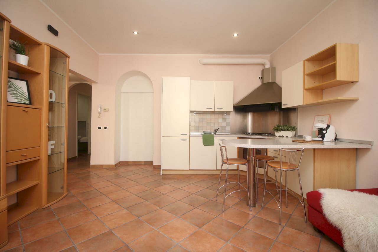 Zona giorno con cucina vista - Appartamento via Bellinzona 309, Como - foto 1