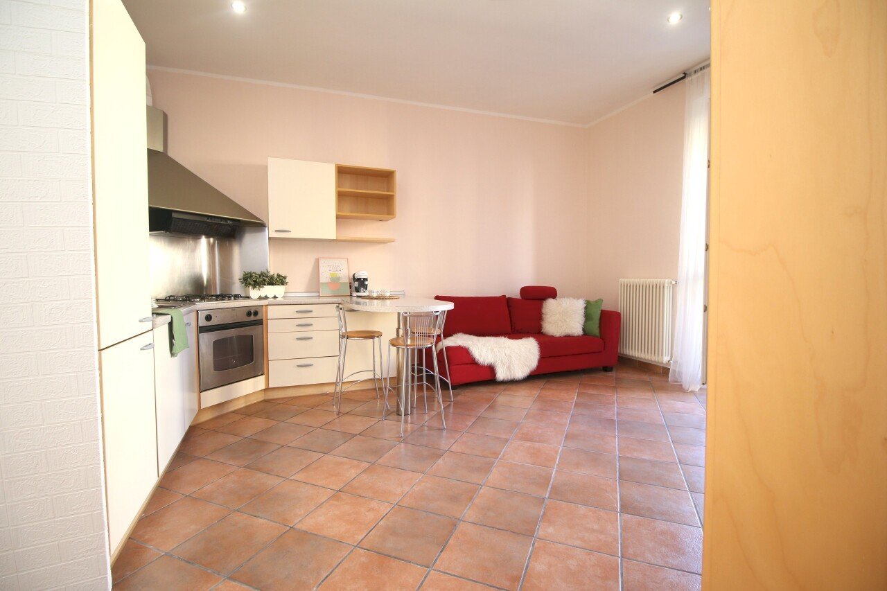 Zona giorno con cucina a vista - Appartamento via Bellinzona 309, Como - foto 2