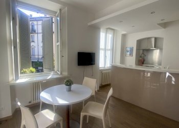Zona giorno con cucina a vista - Appartamento Piazza Alessandro Volta  34, Como - foto 6