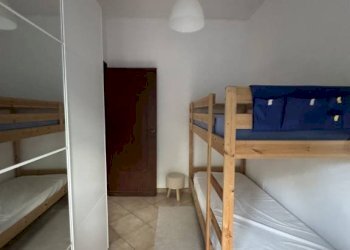 Camera da letto - Appartamento via Edgardo Negri, Roma (zona Villaggio Azzurro) - foto 24