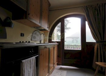 CUCINA CON ACCESSO AL TERRAZZO - Three-room apartment Regione Belvedere 4, Courmayeur - photo 8